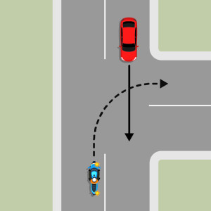 A blue motorcycle and a red car are travelling in opposite directions on the top of a T intersection. The motorcycle is indicating to turn right onto the bottom road, the red car is going straight ahead. The motorcycle must give way to the red car.