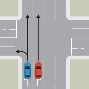 A blue car and a red car are travelling in the same direction in their own lane. Black arrows show the blue car in the left lane car can travel straight ahead or turn left. A black arrow shows the red car can travel straight ahead.