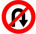 Traffic sign of a black curve arrow pointing down with a red slash prohibition in a red circular border