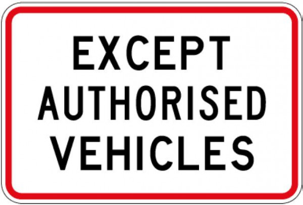 Traffic sign which says except authorised vehicles and it has a rectangular red border