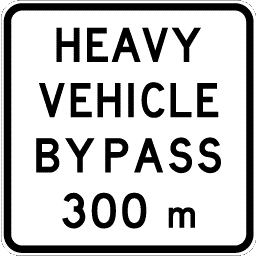 Traffic sign which says heavy vehicle bypass 300m and it has black border