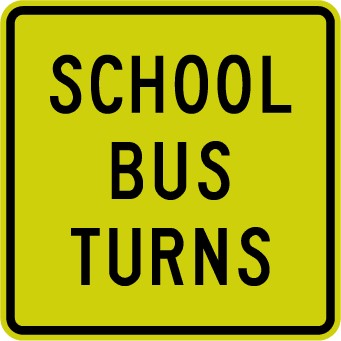 School bus sign which says school bus turns on a yellow background