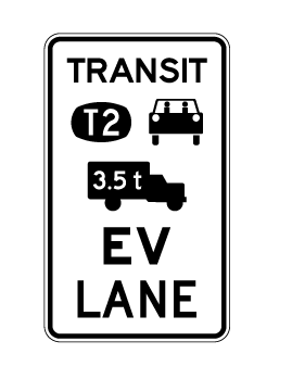 Traffic sign which says transit T2 with car symbol and a 3.5t truck symbol and says EV lane underneath and it has black border