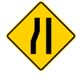 Yellow road sign with black lines that illustrate road narrows on the left side