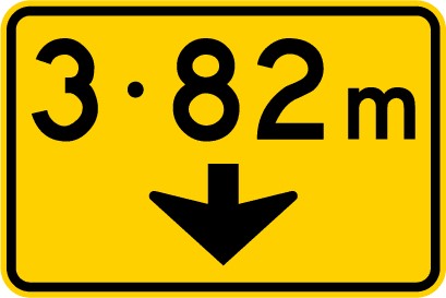 Hazards sign which displays number 3.82m and a small black arrow pointing down underneath on yellow rectangular background