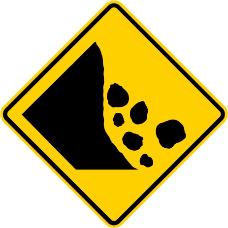 Traffic sign which displays side of a mountain with falling debris icon on diamond shape yellow background