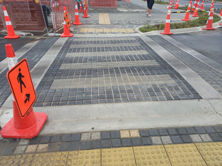 a photo showing a zebra crossing made of pavers that have insufficient contrast