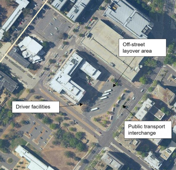 aerial view of an off-street bus parking area with driver facilites