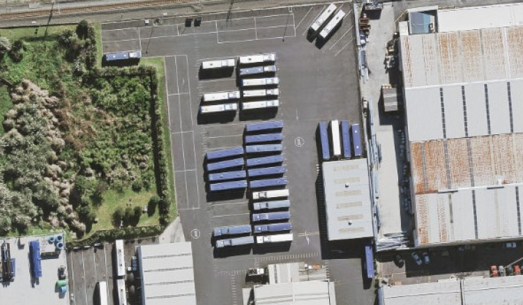 aerial view buses parked in perpendicular of each other