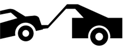 tow away area sign with a black icon of tow truck towing a vehicle 