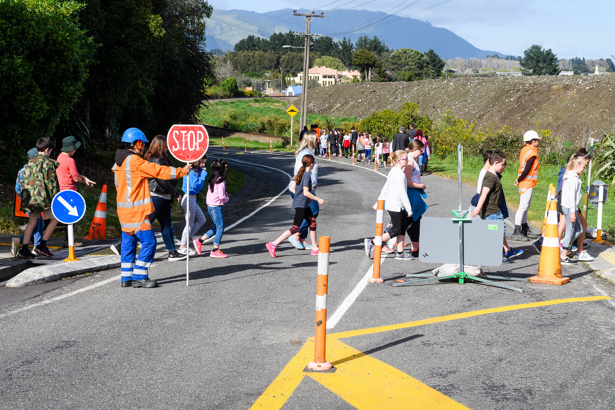 Students, teachers and parents from Waitohu School walking the new pedestrian di