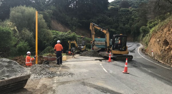 The poles to support traffic signals being installed on Takaka Hill road