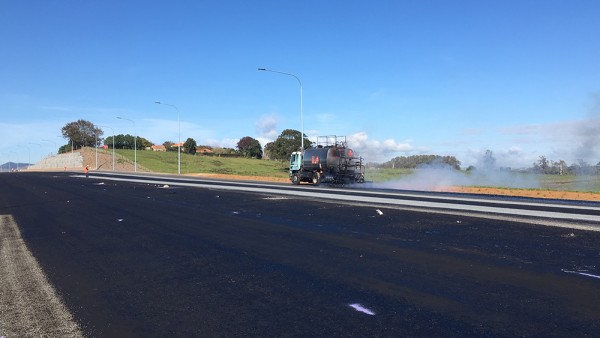Sealing the next section of highway at the Northern Interchange.