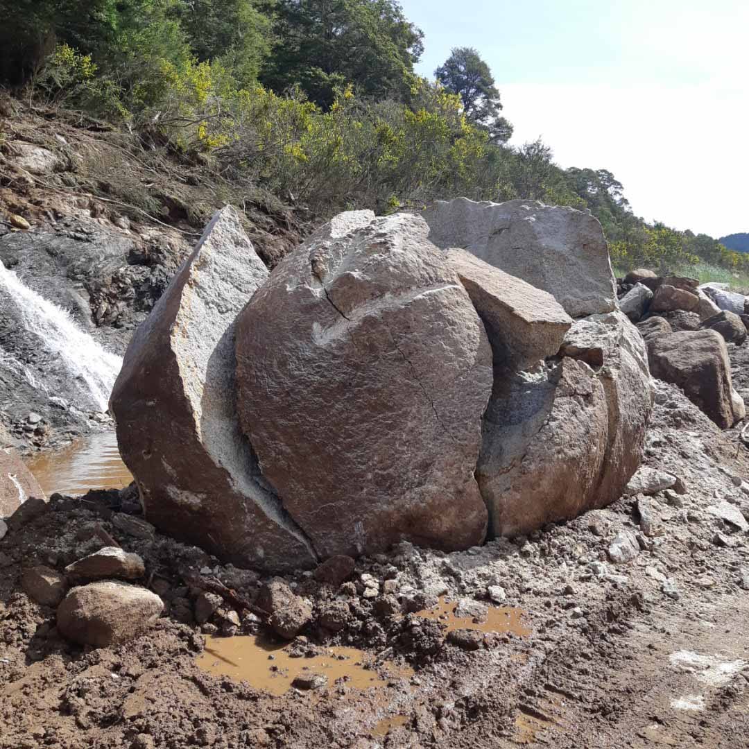 large rock split into pieces prior to being removed from SH6 slip north of Murchison