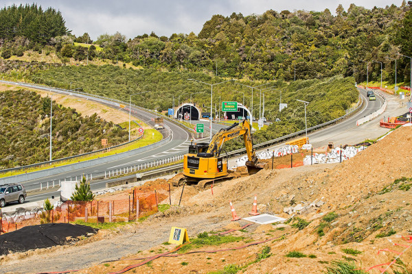 Work site north of the Johnstones Hill tunnels. The northbound lane of Hibiscus Coast Highway is on the right.