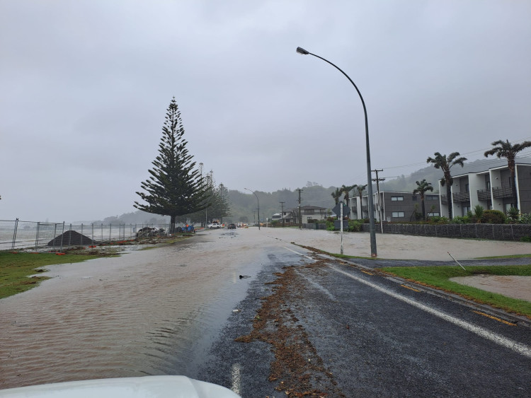 flooding over the a state highway road near the beach
