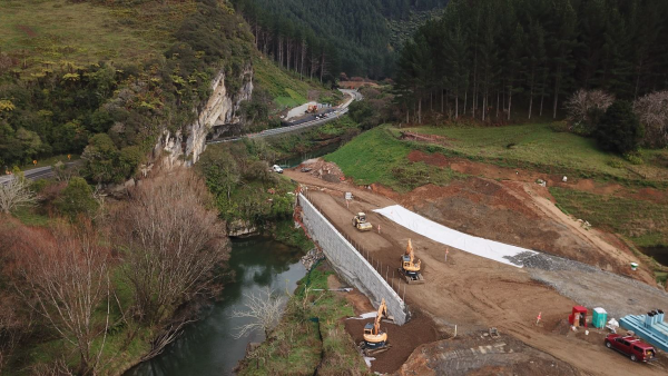 Awakino Tunnel Bypass project – The existing tunnel on the left will be bypassed by two bridges across the Awakino River.
