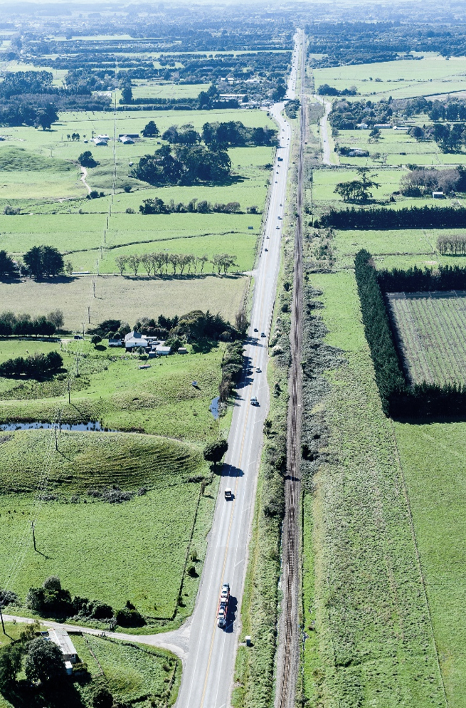 Aerial view of State Highway 1 north of Peka Peka before construction started.