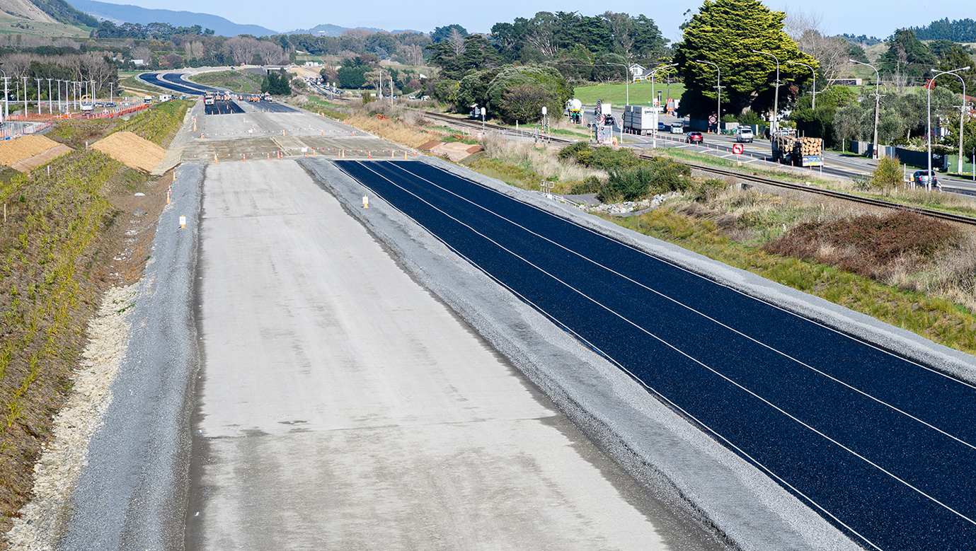 Asphalt laid on one side of the expressway.