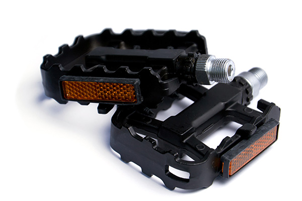 Cycle pedals showing orange reflectors