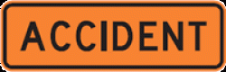 Orange sign with a black border and black text saying accident
