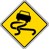 A yellow diamond with a black border and black car with skid trails 