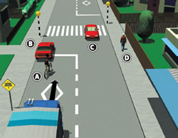 In this one-lane street scenario, the main hazard is the cyclist pulling out behind a parked red vehicle and moving into the direct path of a heavy vehicle that is fast approaching.
