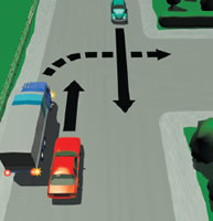 On an unmarked road, a heavy vehicle pulls over to the left shoulder on the road rather than stopping in the middle of the road and waits for the heavy traffic in both directions to clear before making a safe 90 degrees right turn. 