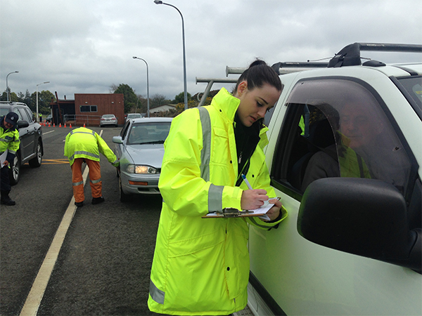 The NZ Transport Agency’s Alana Carlson takes vehicle details from a driver during a recent safety inspection in Rotorua.