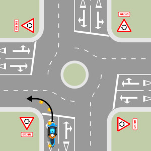 A blue motorcycle is approaching a multi-laned roundabout with four exits, each with give way signs. The motorcycle is indicating to turn left and will continue in the same lane throughout.