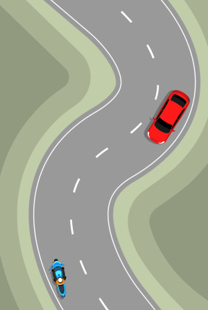 Curved laned road with blue motorcycle and red car keeping left