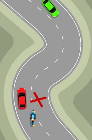 A blue motorcycle is attempting to pass a red car but cannot see the green car around the corner. A red X indicates this is the wrong thing to do.