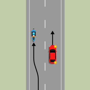 A red car is passing a blue motorcycle. A black arrow shows the motorcycle moved from the centre of the lane to the left of the lane.