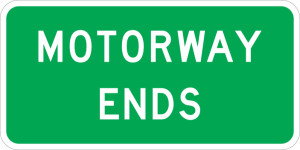 A green rectangle with white border that reads in white text motorway ends.