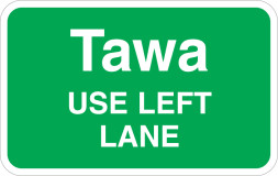 A green sign with the text Tawa, use left lane.