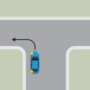 A blue car indicating and turning left.