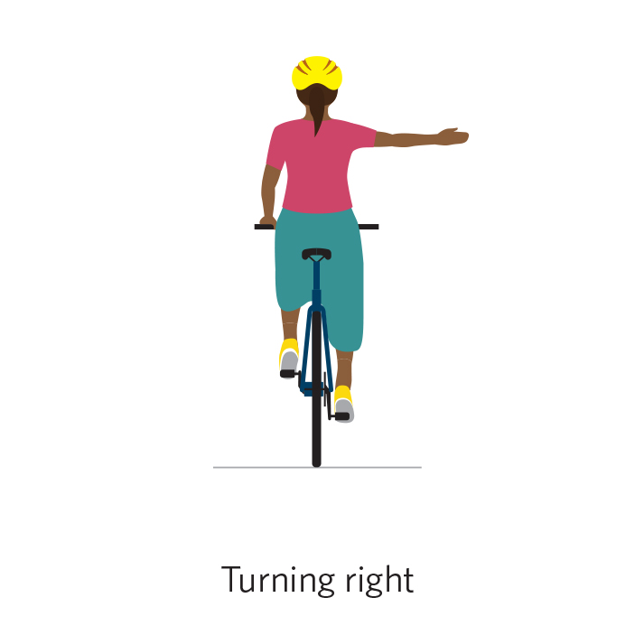 A person on a bicycle holds their right arm out to signal right.