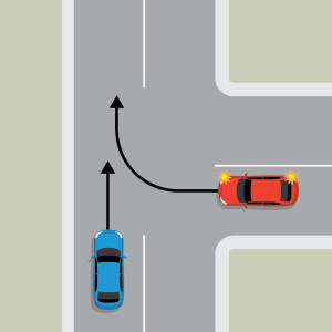 A blue car is driving straight on the continuing road of a T intersection. To the right, a red car is indicating to turn right out of the terminating road of the T intersection, into the flow of traffic.