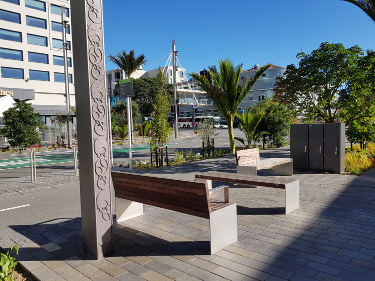 Benches in a sunny place in a pedestrian area.