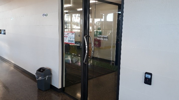 driver facility with double glass doors located within public transport interchange
