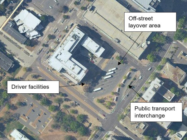 aerial view of an off-street bus parking area with driver facilites