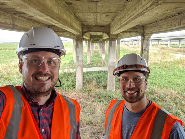 Dr Lucas Hogan and his colleague Dr Max Stephens under the old trestle bridge before deconstruction started