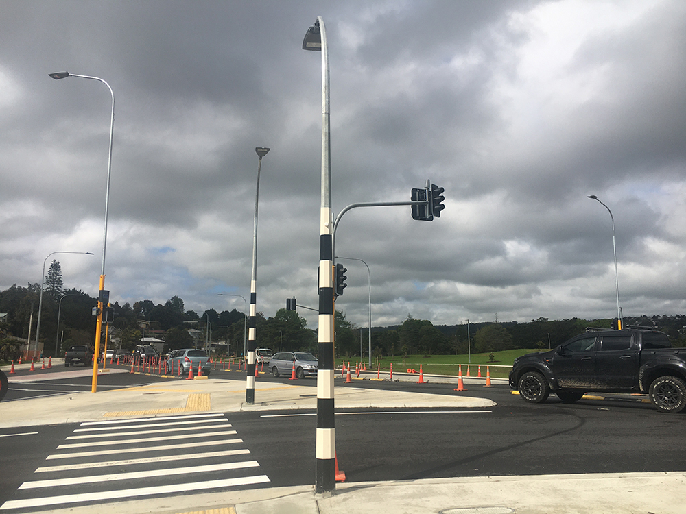 The new intersection on SH1 at Tarewa Road, with a pedestrian crossing and traffic lights.
