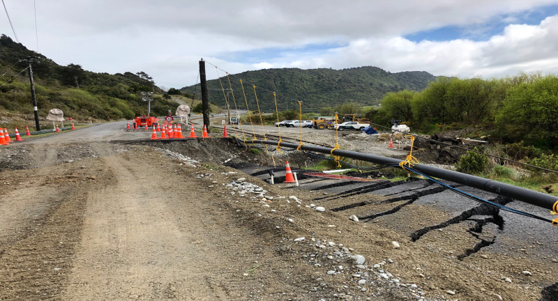 The Omoto highway, SH7, on Monday, 7 October. The black pipe is the Grey District Council’s wastewater pipe with telecommunications  lines suspended underneath.  