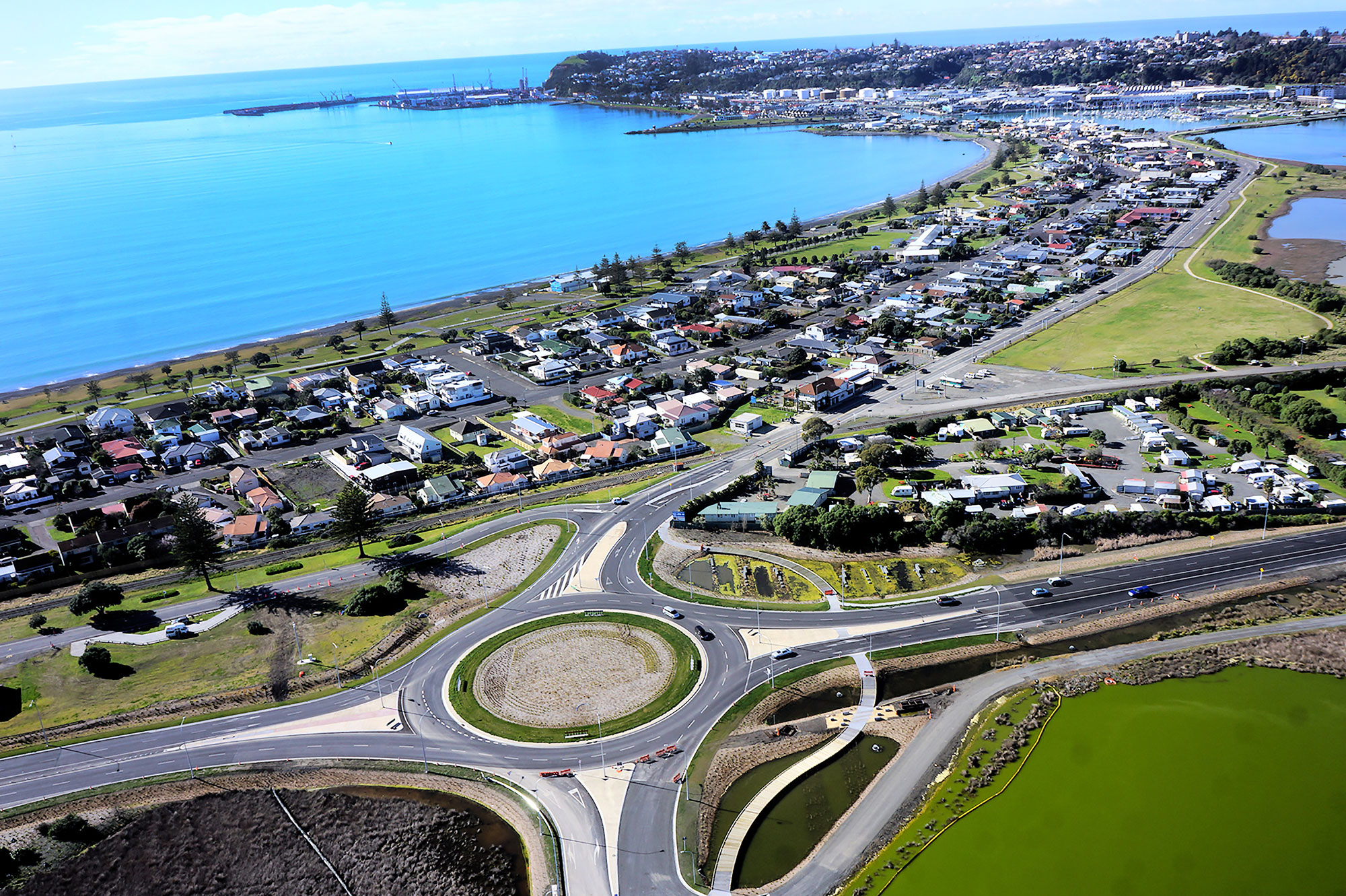 Aerial view looking down on roundabout and residential area north of Napier Port