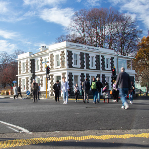 Pedestrians at a busy Otago University campus crossing 